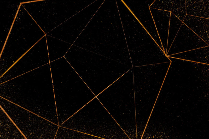 Geometrische Tapete in Schwarz und Gold